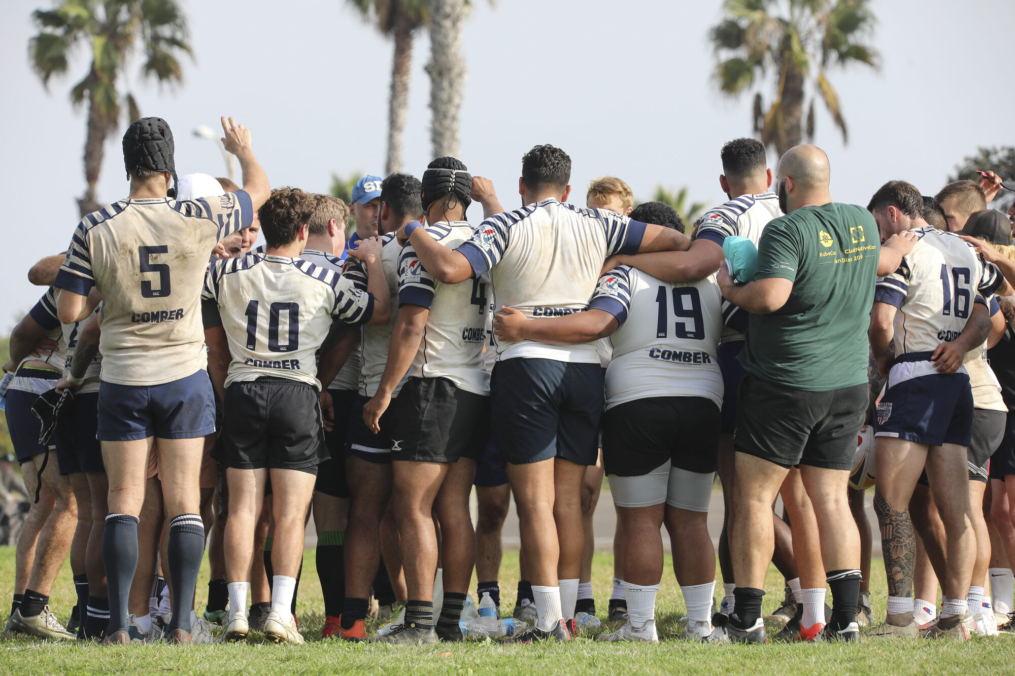 OMBAC team huddle at Robb Field